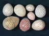 Composition of 8 porcelain eggs, 2004.